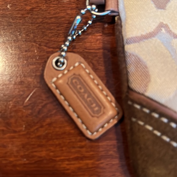 Coach wristlet bag, 7 x 4 inches, 13 inch strap, suede front corners, top zip - Picture 2 of 5